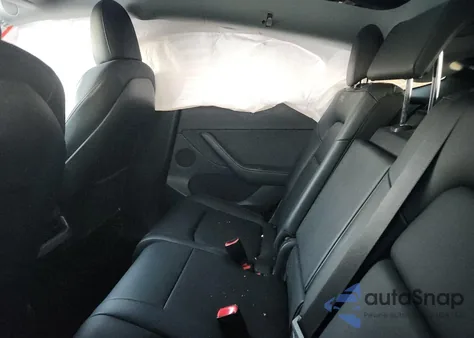 2022 Tesla Model Y из США, поврежденный, VIN 7SAYGAEE1NF464886